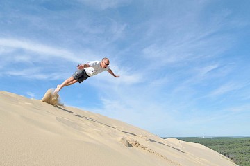 Martyn jumping off the top of the Dune du Pyla, France