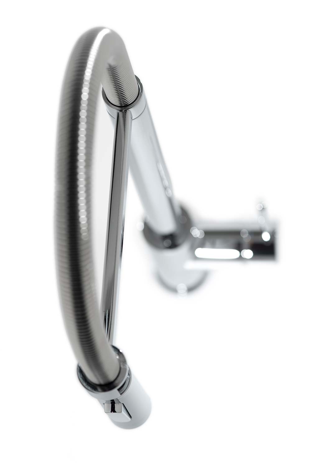 Shallow depth of field photograph of a tap from above