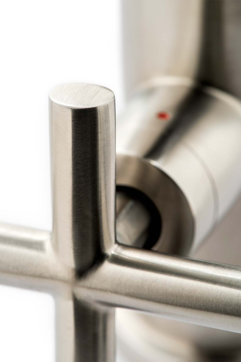 Close up macro photography of a brushed nickel tap handle