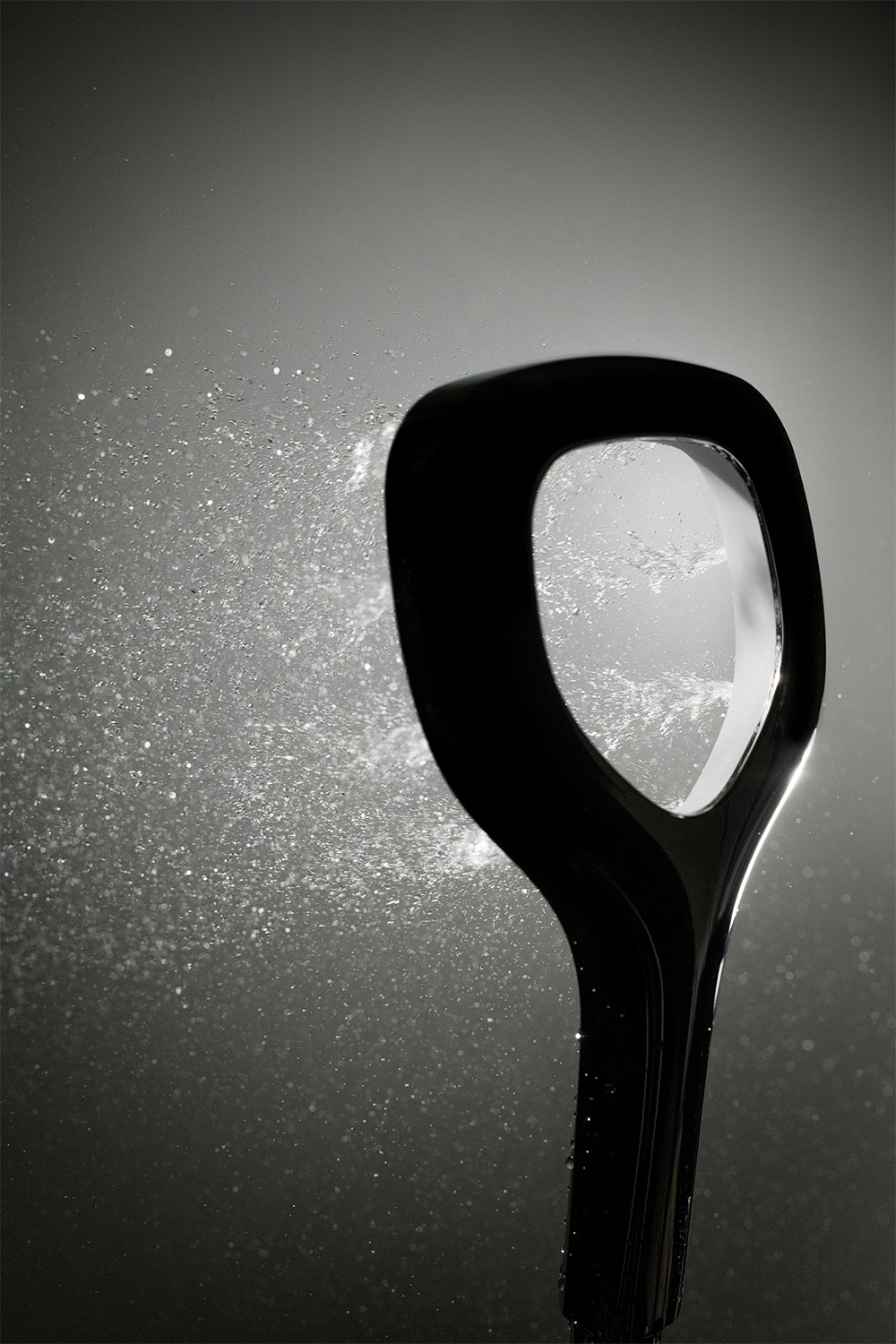High speed photography of water spray from a shower handset (1/8000th second)